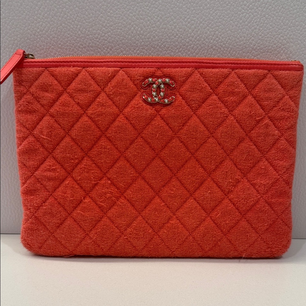 CHANEL Coral Quilted Clutch